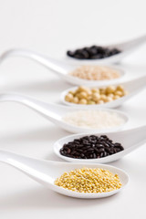 various cereal with spoons