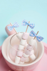 marshmallow on green background