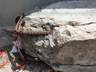 concrete pile smashed pieces of concrete rubble debris on construction site.old rusty wire,Steel reinforcement