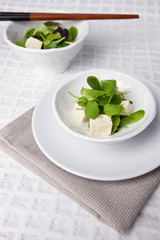 tofu salad and chopsticks