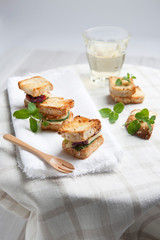 mini sandwiches on the table