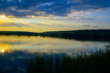 Fototapeta na wymiar Reflection of the sunset in the lake.