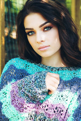 Portrait of a woman with bright autumn makeup