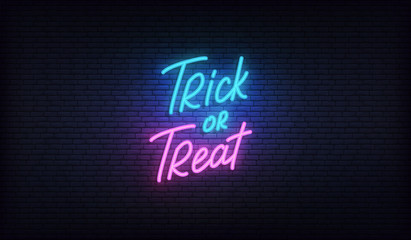 Trick or Treat neon lettering sign. Halloween holiday vector design