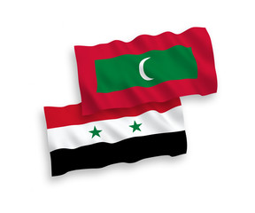 Flags of Maldives and Syria on a white background