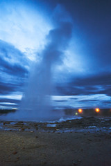The night landscape of Geysir in Iceland the great column of hot water and water vapor begins to fade