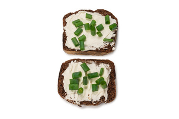Brown bread and cheese isolated on white background.