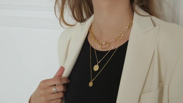 girl model in a suit with jewelry