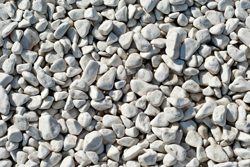 Drainage systems from small pebbles. Garden drainage for plants and trees. White stones for roads and flower beds.