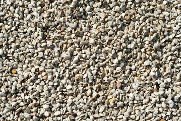 Drainage systems from small pebbles. Garden drainage for plants and trees. White stones for roads and flower beds.