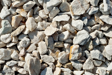 Drainage systems from small pebbles. Garden drainage for plants and trees. Yellow stones for roads...