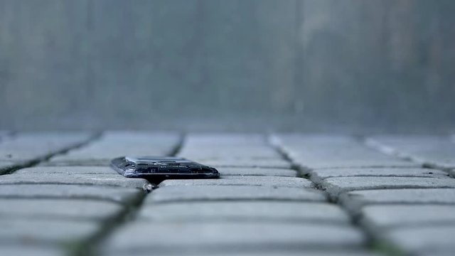 Smartphones cellphone phone drop to the ground. Make the screen broken and damaged. accident insurance technology, repair and maintenance.