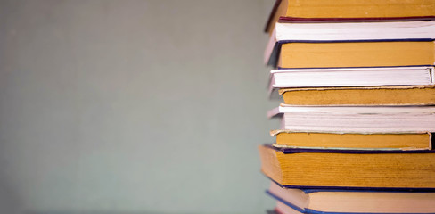 Stack of books banner. Education concept. Reading classical literature. Scientific research. Copy space