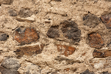 A medieval stone wall.  Abstract background with stone texture. 