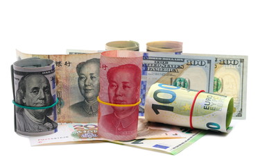 Chinese yuan, American dollar and European euro hundred bills, banknotes, cash money rolls isolated on white background