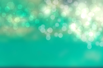 Abstract gradient turquoise light green shiny blurred background texture with circular bokeh lights. Beautiful backdrop. Space for design.