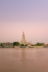 Fototapeta na wymiar Wat Arun and Chao Phraya river in Bangkok, Thailand at dawn