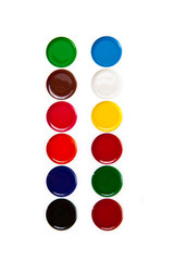 watercolor paints in a box on a white background