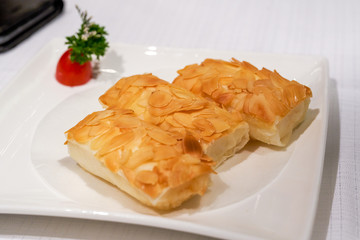 A classic Cantonese dessert, almond fried milk