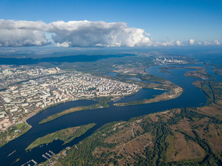 High view of the Dnieper river in Kiev. A cloud over the city.