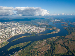 High view of the Dnieper river in Kiev. A cloud over the city.