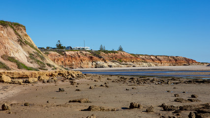 The eroding iconic red cliffs at the Onkaparinga River mouth at Port Noarlunga South Australia on August 25th 2020