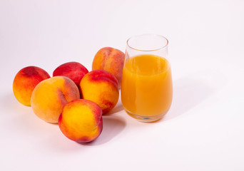 a glass of peach juice
