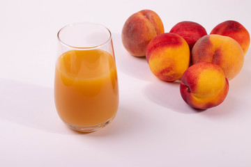 a glass of peach juice
