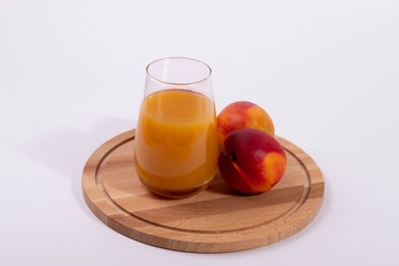 a glass of peach juice