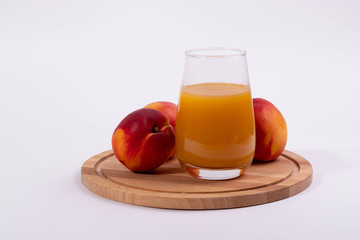 a glass of peach juice