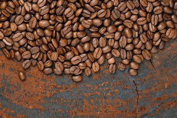 coffee beans on wooden table background with empty copy space
