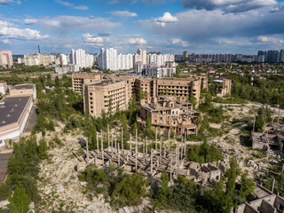 Fototapeta na wymiar Aerial drone view. Abandoned unfinished building of the city hospital in Kiev.