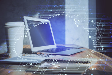 Double exposure of desktop computer and technology theme hologram. Concept of software development.