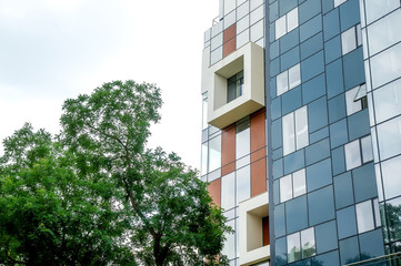 Color construction aluminum.Facing the building with a ventilated facade. Aluminum colored facades. Modern facades Construction of a comercial centre