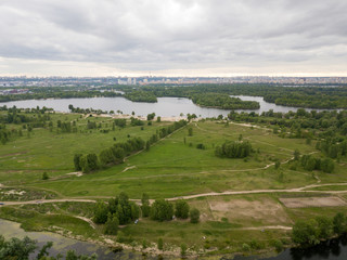 Fototapeta na wymiar Aerial drone view. City lake in Kiev