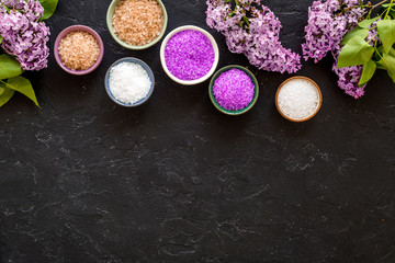 Layout of sea pink salt with branch of flowers top view