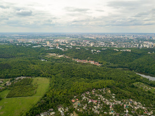Fototapeta na wymiar Aerial drone view. Green spring forest