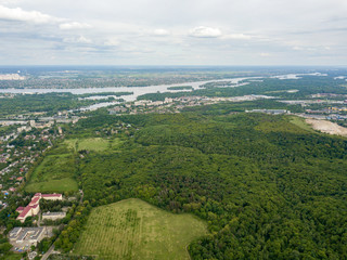 Obraz premium Aerial drone view. Green spring forest