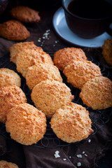 Homemade oatmeal cookies with cottage cheese with a cup of coffee, selective focus
