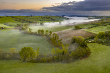 Lush green River valley Tuscany