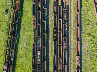 Freight trains on the railroad at the depot. Aerial view.