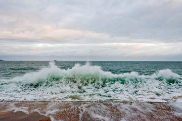 Big high tide and big waves on the Chaussée du Sillon in Saint Malo, Brittany, France