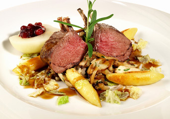 Medium Deer Fillet with Vegetables on Cranberry Sauce - Isolated