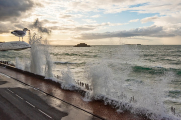Big high tide and big waves on the Chaussée du Sillon in Saint Malo, Brittany, France