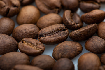 Coffee beans close-up background. Fresh roasted