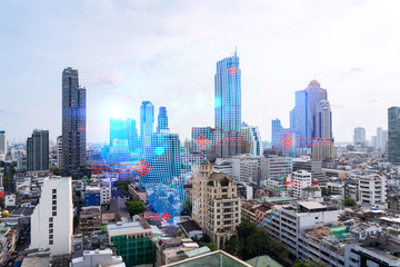 World planet Earth map hologram over panorama city view of Bangkok, Asia. The concept of international connections and business. Multi Exposure.