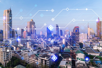 Technology hologram over panorama city view of Bangkok. The largest tech hub in Asia. The concept...