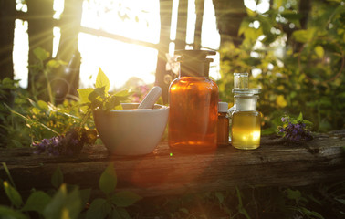 Healing herbs and medicinal bottles. Alternative medicine concept.