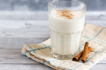 Kefir with cinnamon in a glass for boost the immune system. Immunological and stomach benefits,...