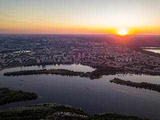 Aerial drone view. Sunset over the Dnieper River and the city of Kiev.